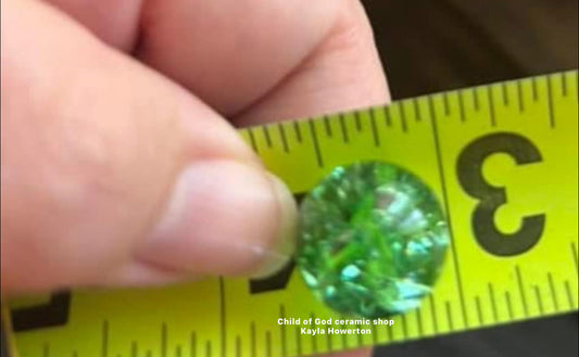 Green glass cracked marbles