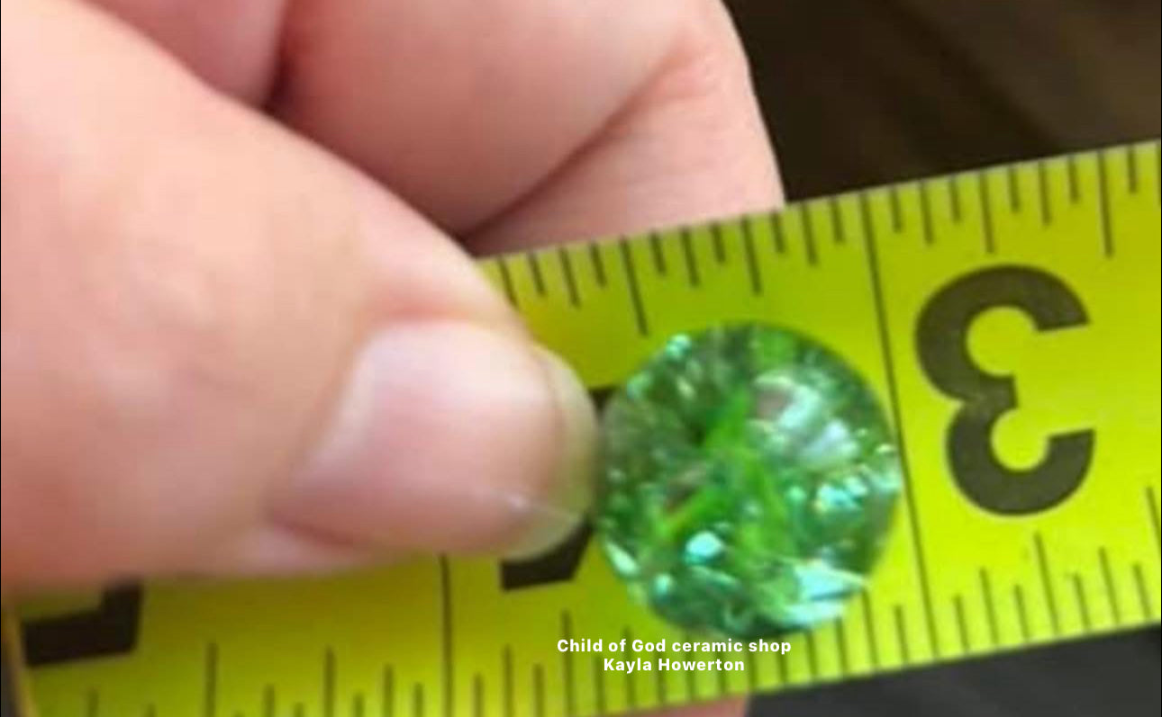 Green glass cracked marbles