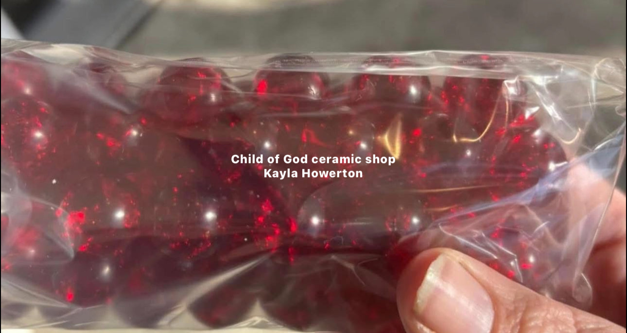 Red glass cracked marbles